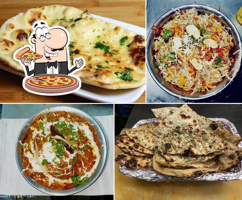 Try out pizza at Apnadhaba Taste Of Punjab Pure Veg