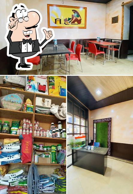 Take a seat at one of the tables at Tandoori Chicken Corner