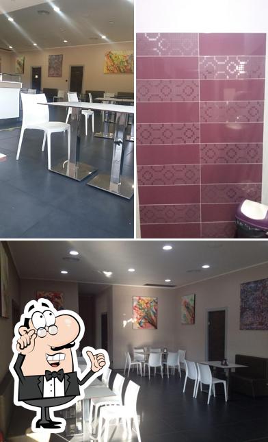 Siediti a un tavolo di Bar Caffetteria Barbato