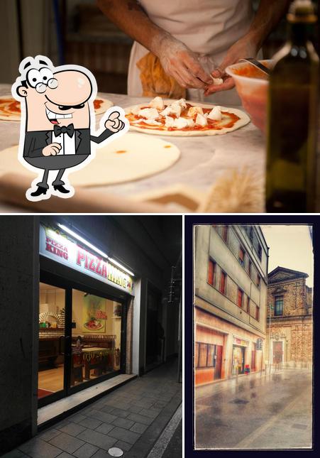 La immagine di esterno e tavolo da pranzo da Pizza King