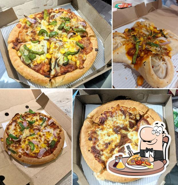 Try out pizza at Pizza Hut IIM Road Ambawadi, Ahmedabad