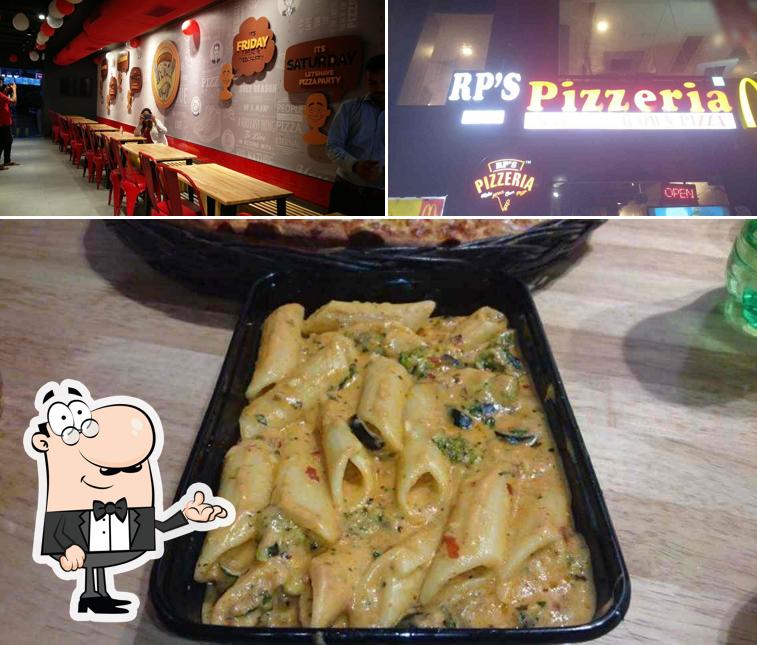 The image of RP's Pizzeria Vijay Cross Road’s interior and food