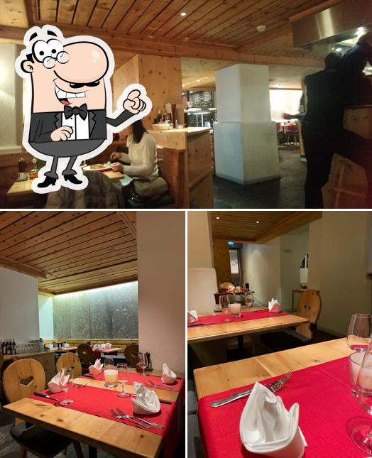 La immagine della interni e tavolo da pranzo di CARUSO – Pizza & Pasta