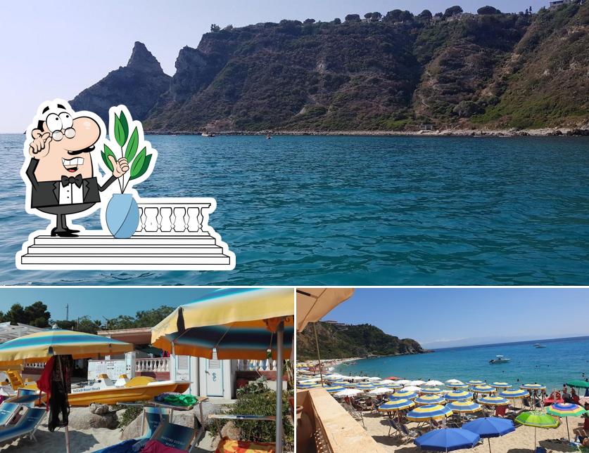 Puoi goderti l'aria fresca da seduto all'esterno di Ristorante La Grotta