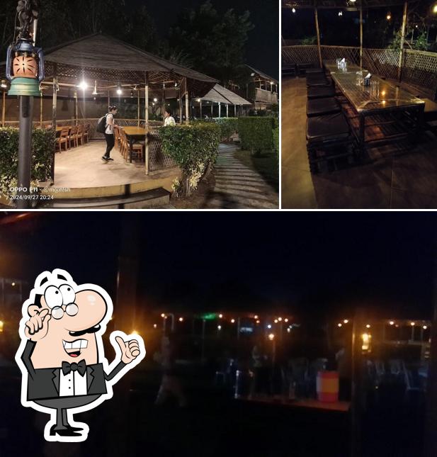 Take a seat at one of the tables at Kansar Garden Restaurant