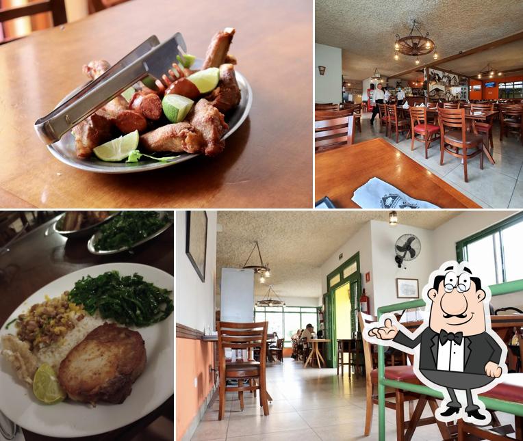 Sente em uma das mesas no Restaurante Cabana de Minas