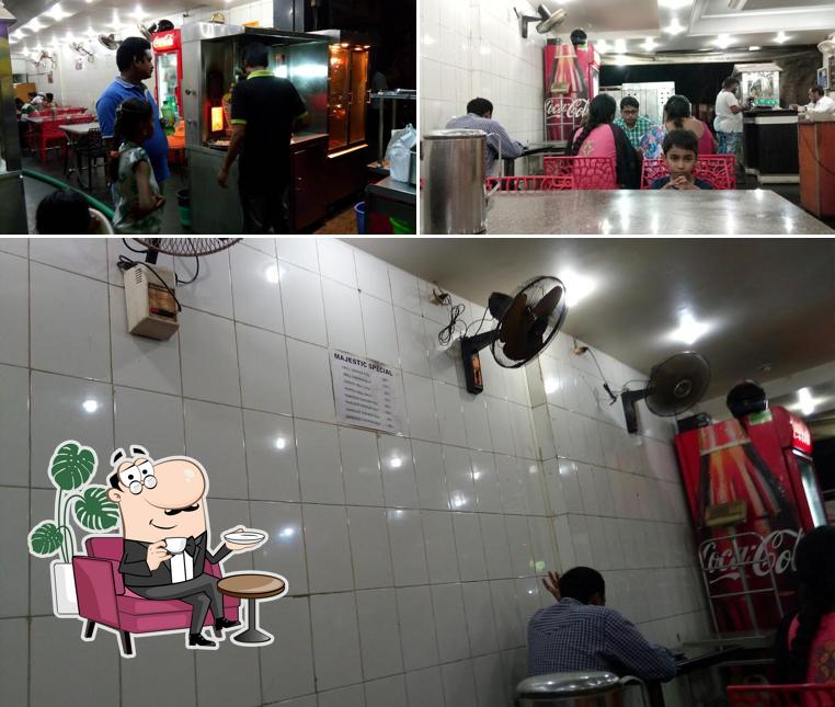 Take a seat at one of the tables at The Majestic Hotel