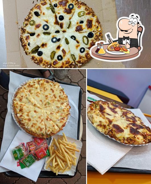 Get pizza at Heaven Pizza & Cafe