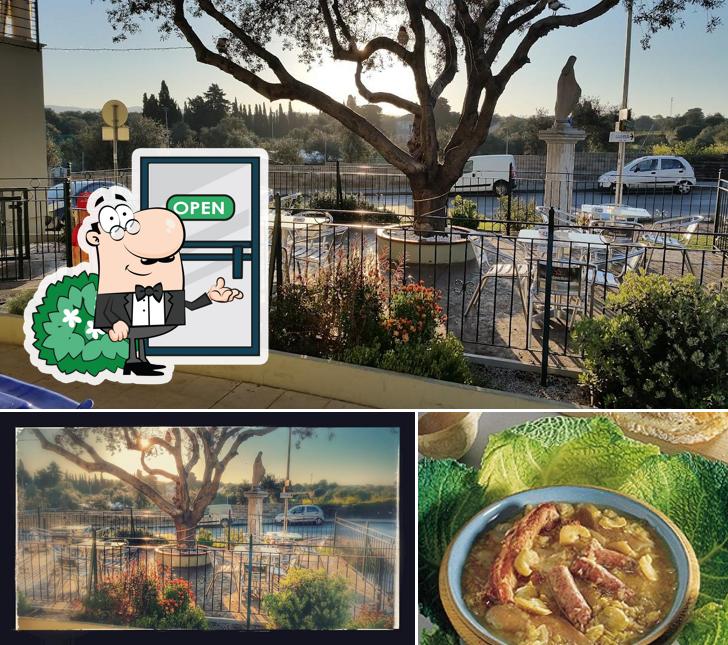 Questa è la immagine che presenta la esterno e cibo di Victory Bar