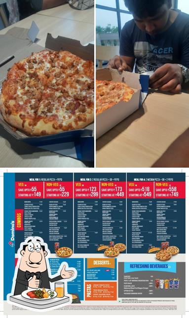 The photo of Domino's Pizza Bharat City, Ghaziabad’s food and exterior