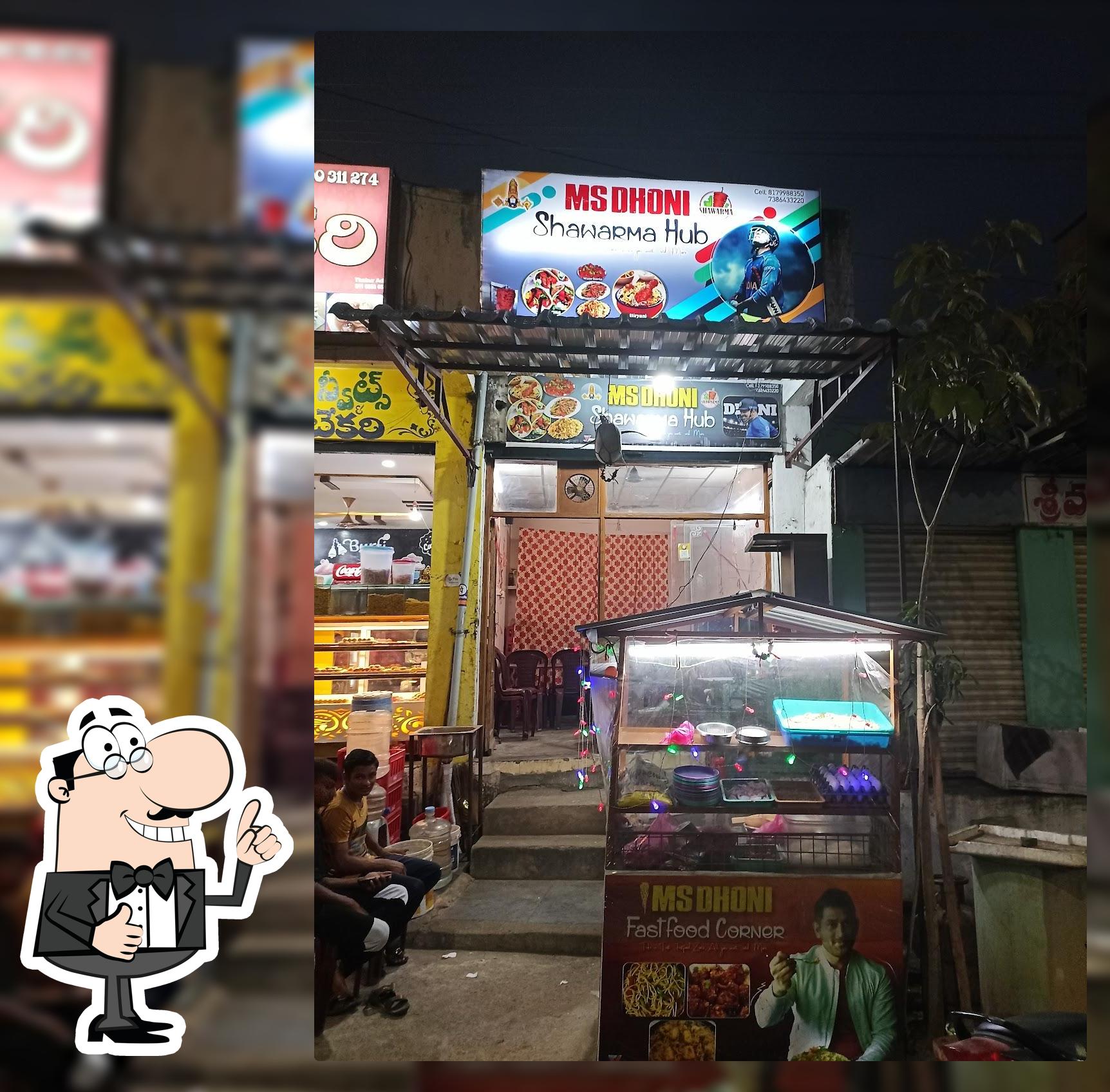 The advertisement shows information about M S Dhoni Shawarama Hub 1