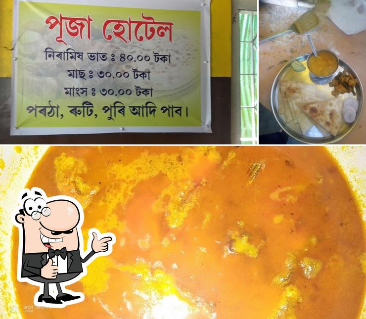 Look at the image of Puja Hotel