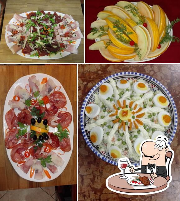 Prenditi i un pasto a base di carne a Tradizione e Sapori - Salumeria Enoteca