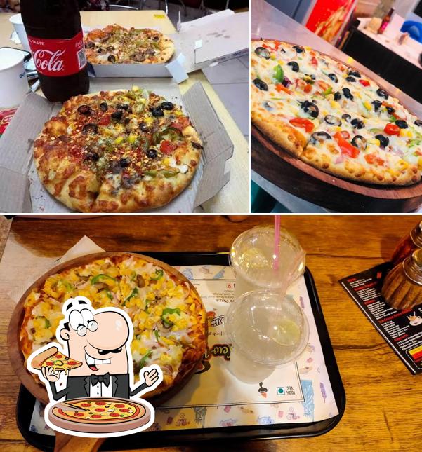 Pick pizza at The New York Pizza