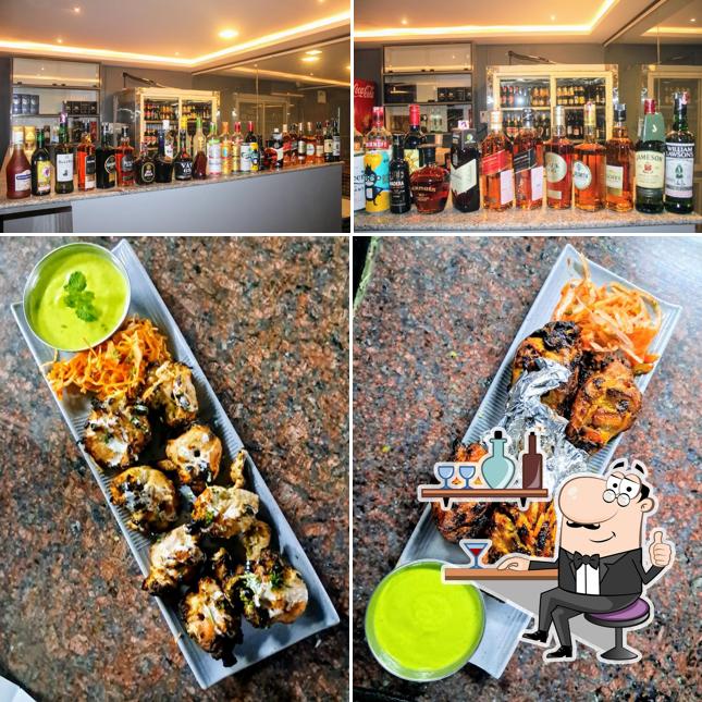 Take a look at the image displaying interior and food at Lucky Bar