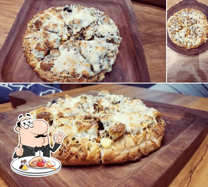 Get pizza at The Spoonful Cafe