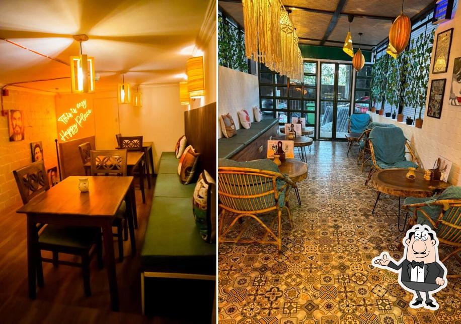 Take a seat at one of the tables at Nomadic Noms Cafe