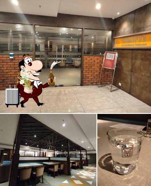 Trupthi AC Restaurant serves alcohol