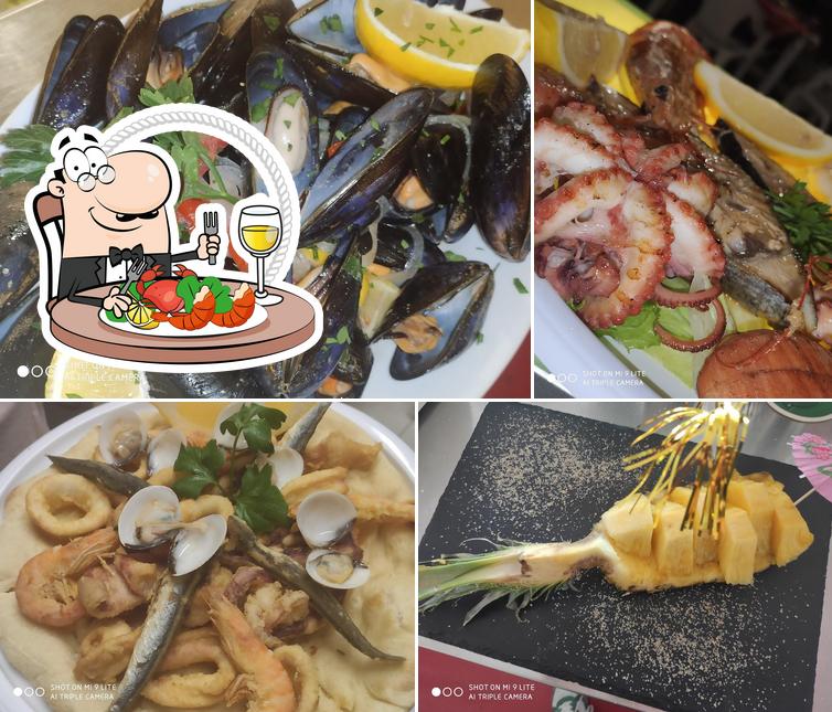 Prenditi la cucina di mare a Lounge Cafè De Mar