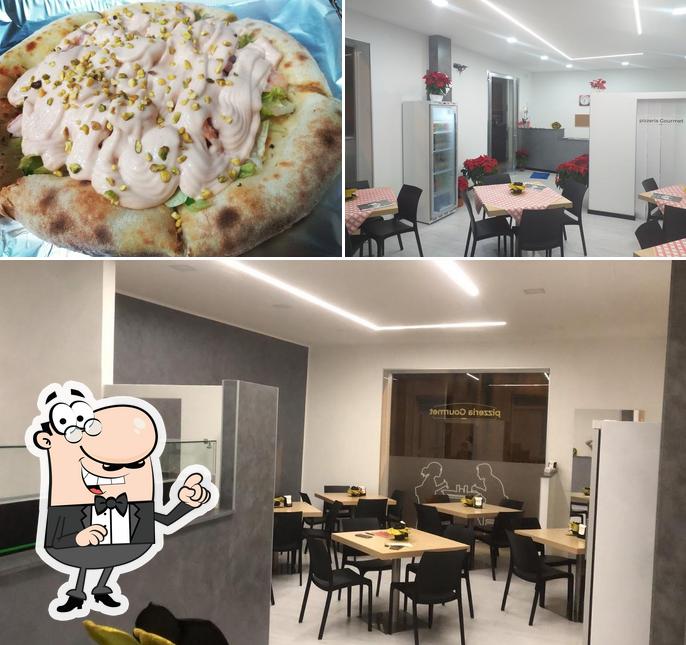 Guarda la immagine che raffigura la interni e cibo di Pizzeria Gourmet Vittoria