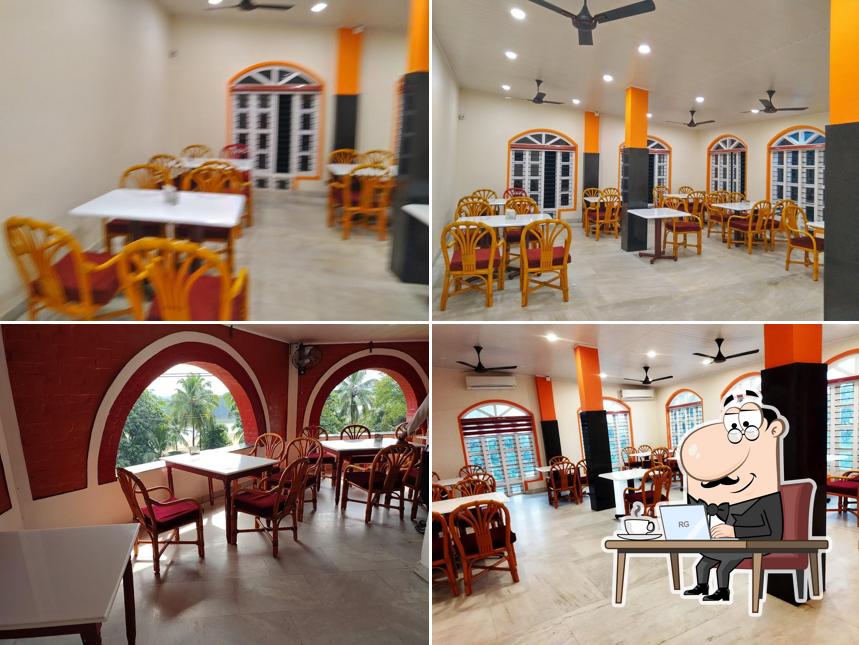 Take a seat at one of the tables at Aahaar