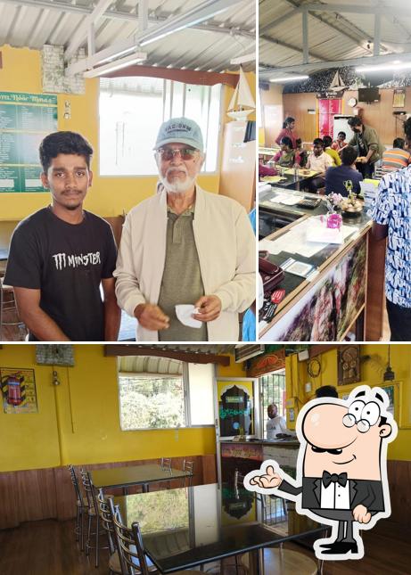 Take a seat at one of the tables at Hotel Noor Mma's family restaurant