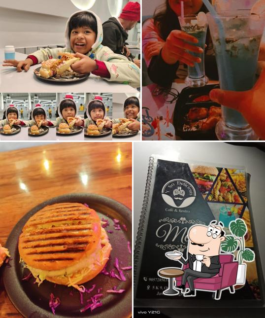 The interior of Y so delicious cafe $ restro
