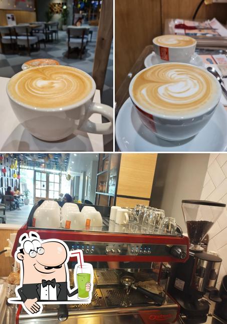 Barista serves a selection of beverages