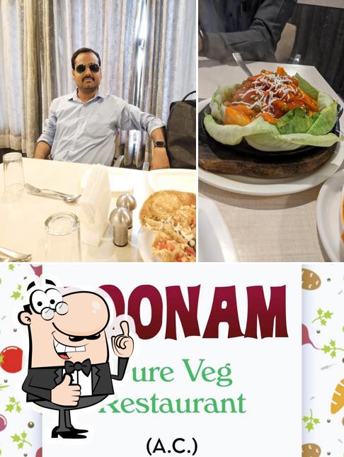 Look at this image of Poonam Pure Veg Restaurant