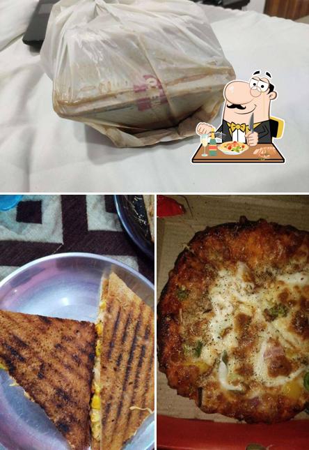 Take a look at the picture showing food and interior at YUM YUM CAFE
