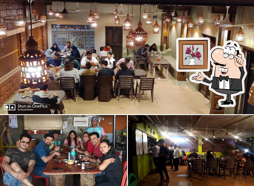 Take a seat at one of the tables at Masala Kitchen Restaurant