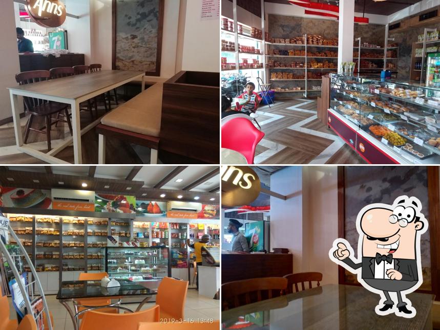 Take a seat at one of the tables at Anns Bakery Chembumukku