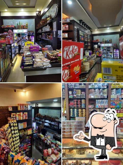 Take a seat at one of the tables at BR BAKERY ICE CREAM PARLOUR