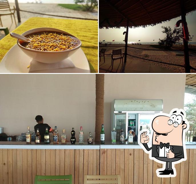 Look at the photo of Bare Feet Beach Shack