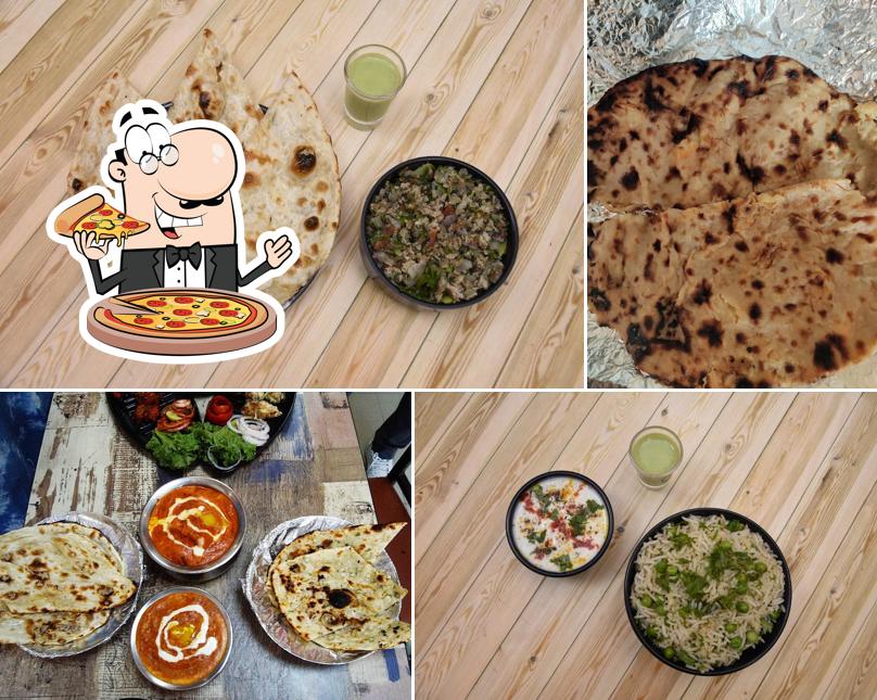 Pick pizza at Flavours of Chakhna