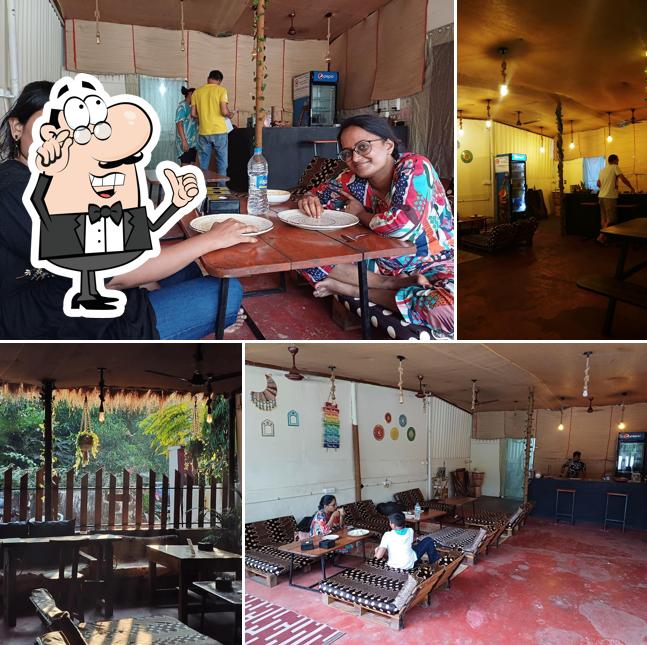 Take a seat at one of the tables at Cafe Krishnam