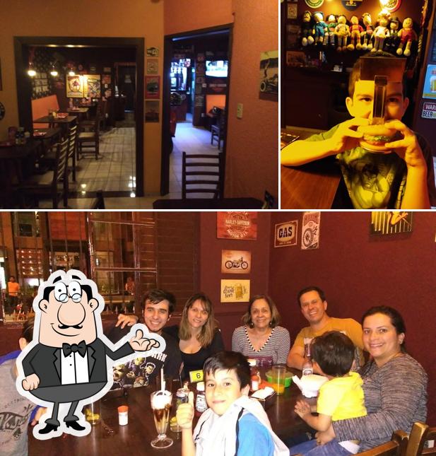 Entre diferentes coisas, interior e comida podem ser encontrados no Bisão Dourado - Pizzaria e Restaurante