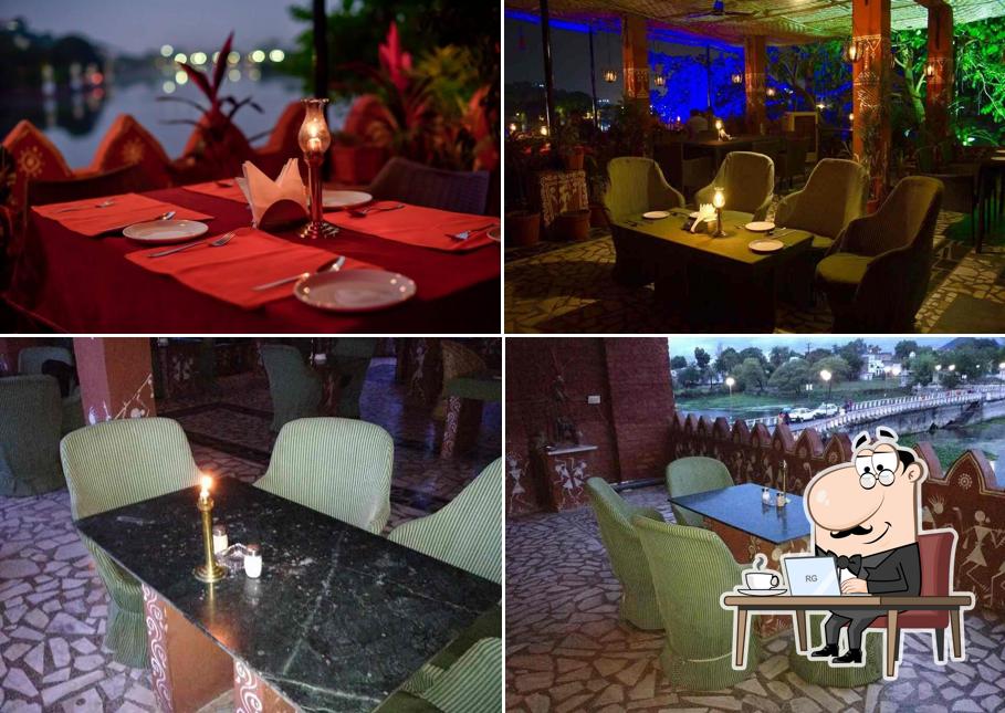 Take a seat at one of the tables at Candle light restaurant