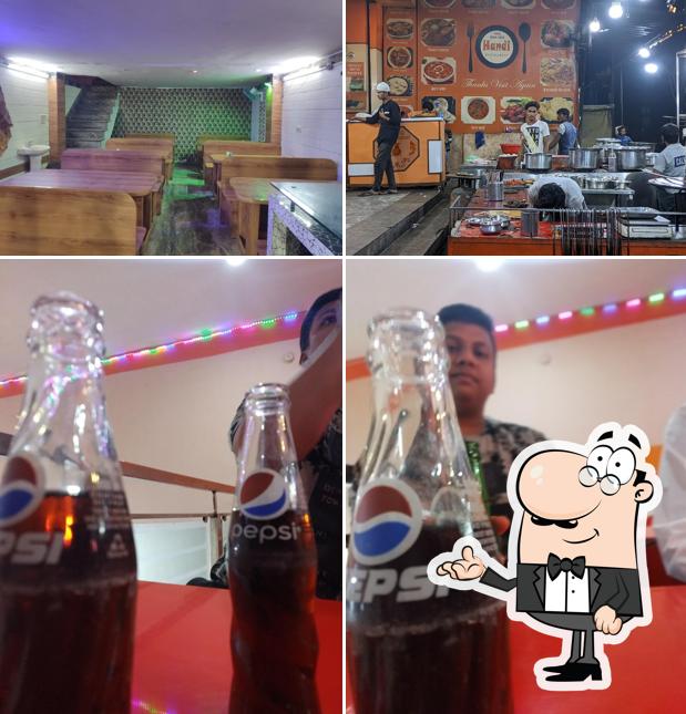 The photo of interior and drink at Handi Restaurant