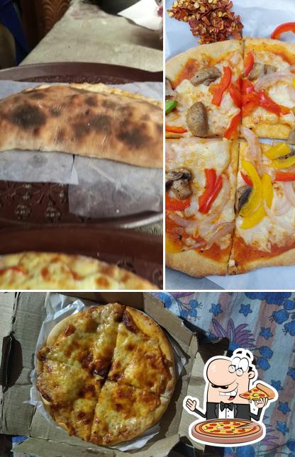 Try out pizza at Smoke Wood Pizzera
