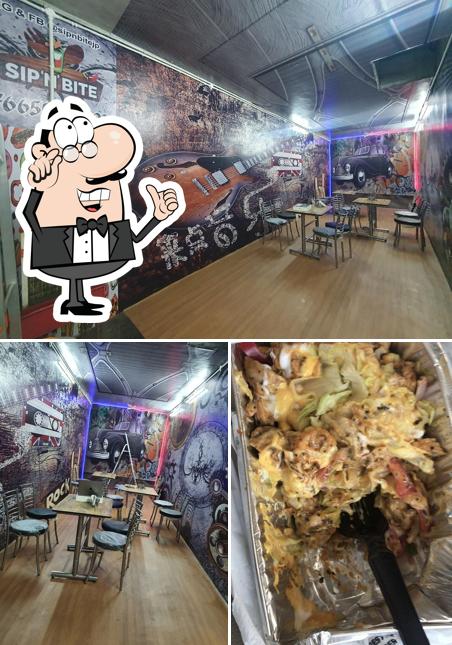 This is the picture depicting interior and food at Sip 'N' Bite
