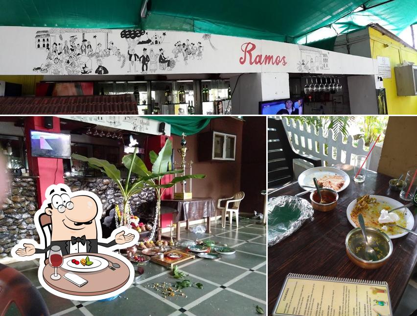 Check out the image showing dining table and exterior at Ramos Bar And Restaurant