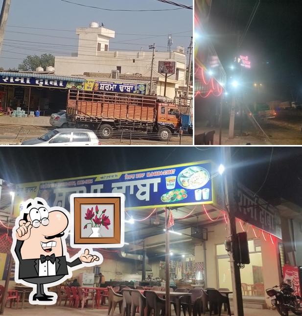 Take a seat at one of the tables at Sharma Punjabi Dhabha & Restaurants Since 1983
