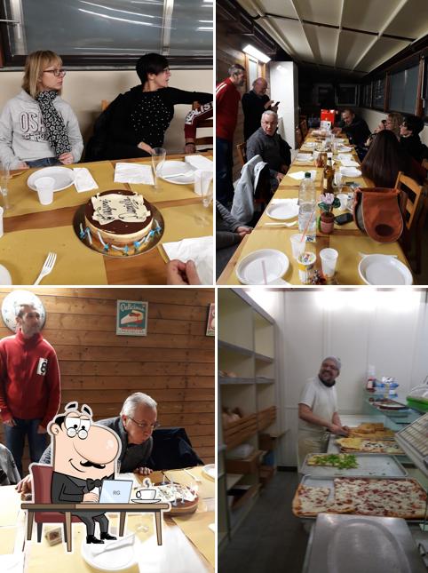 Questa è la foto che presenta la interni e tavolo da pranzo di Forno Di Mari - Forno e Pizzeria da Asporto