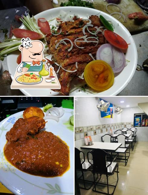 The photo of Jay Malhar Hotel’s food and interior
