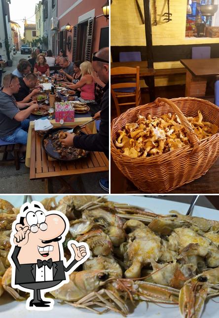 La foto della interni e cibo di Konoba "Kod Kristijana"