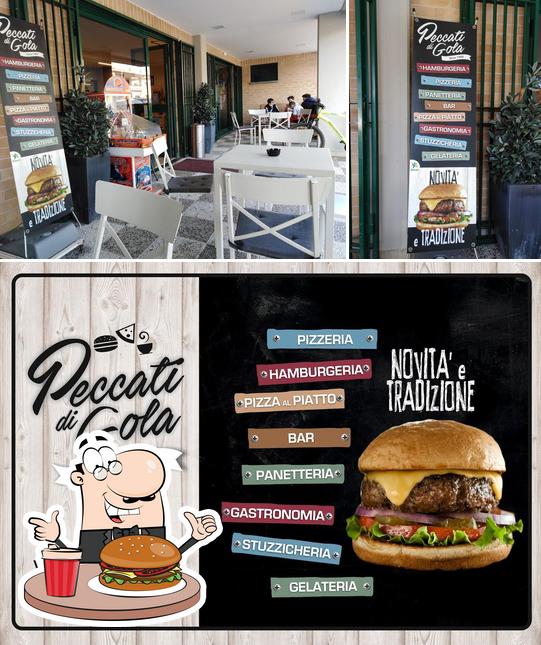 Prenditi un hamburger a Pizzeria Peccati di Gola di M. Bartoli