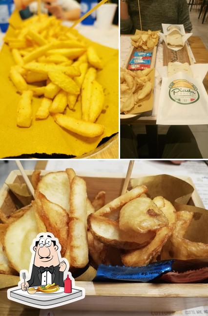 Assaggia un piatto di patatine a Piada Concept