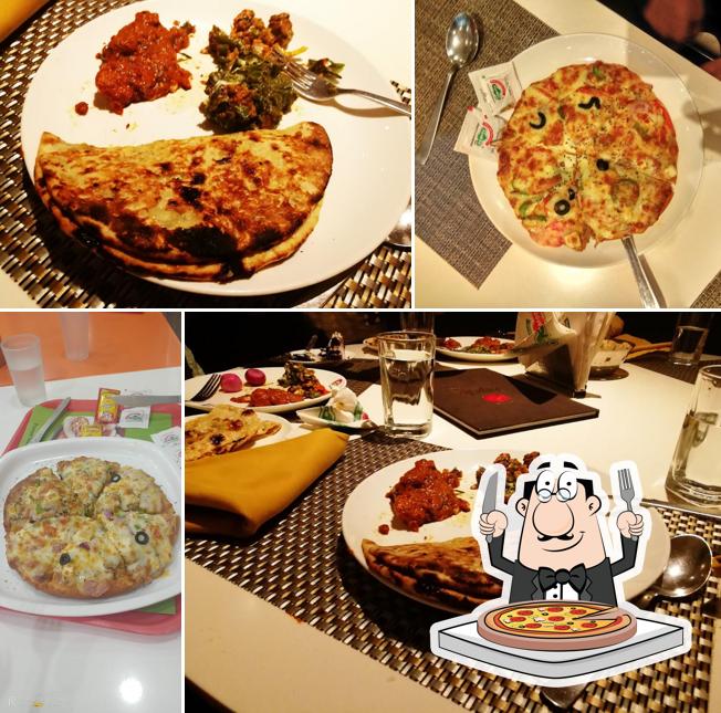 Pick pizza at Paprika Fine Dine Pure Veg Restaurant