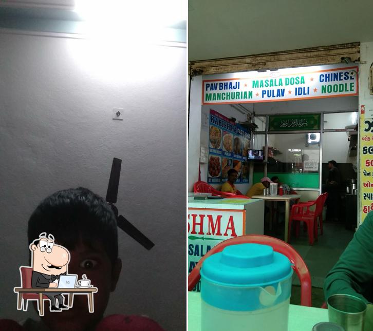 Take a seat at one of the tables at Karishma Fast Food